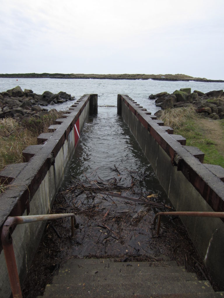 The Florence north jetty SCUBA Park entrance which we think is the best beginner SCUBA diving site in Oregon.